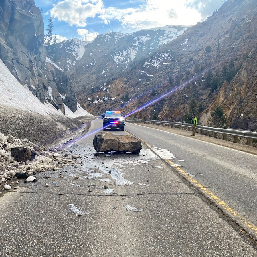 Large boulder blocks Highway 40 in Byers Canyon